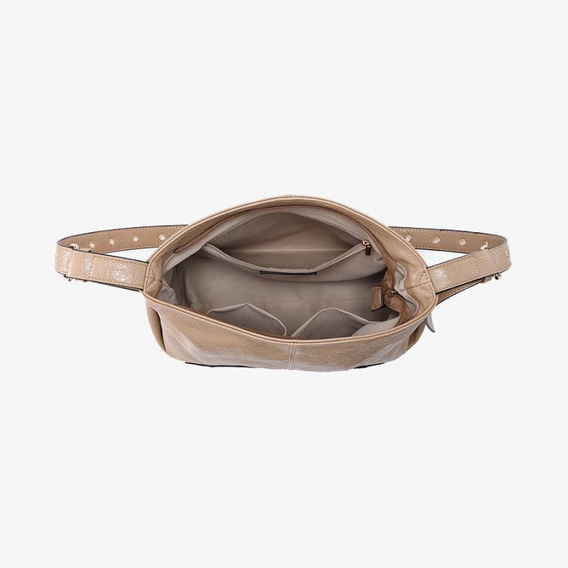 Beige leather bag on a white background