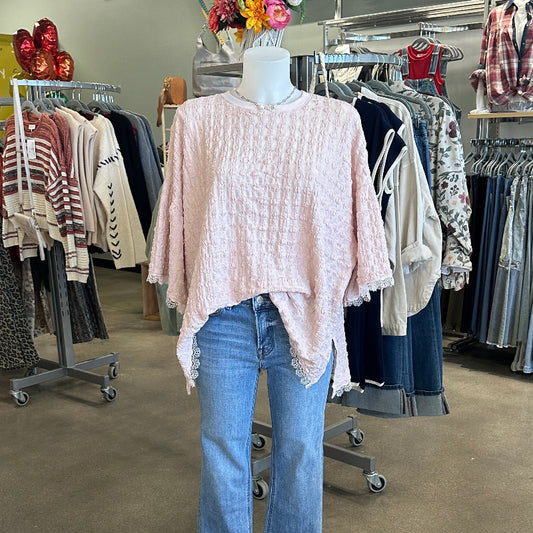 Light pink top on mannequin