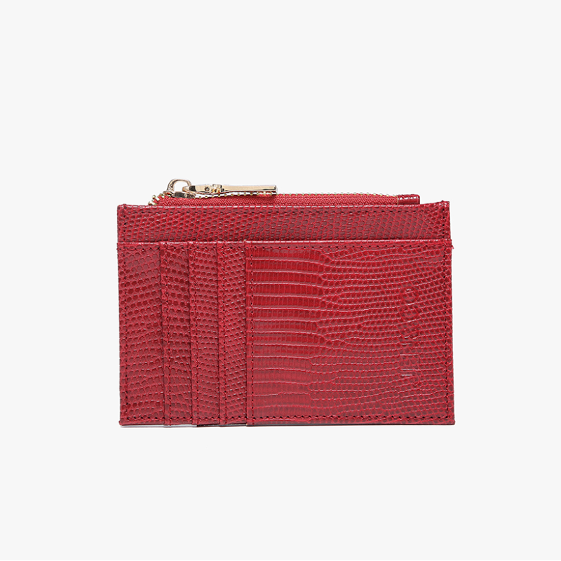 Red textured wallet on a light beige background
